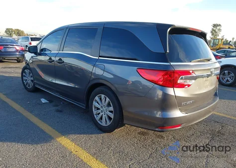 2018 Honda Odyssey Lx z USA, uszkodzony, nr VIN 5FNRL6H29JB101502